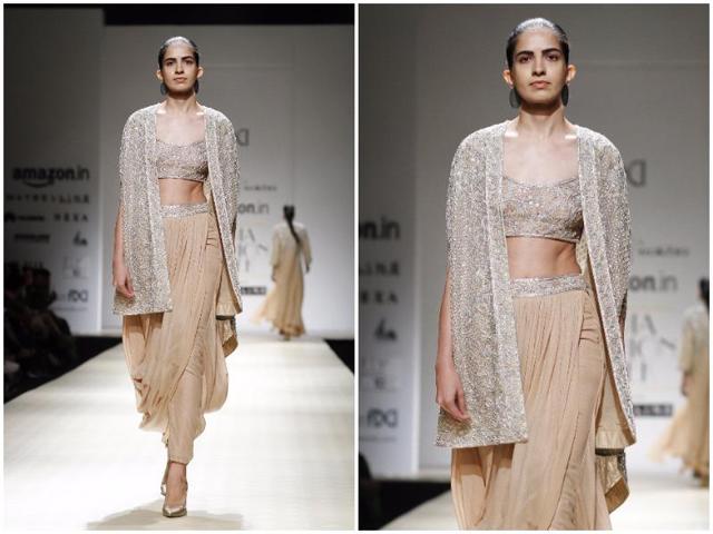 A model sporting cape dhoti for Rabani & Rakha. (Waseem Gashroo/HT Photo) A model sporting cape dhoti for Rabani & Rakha. (Waseem Gashroo/HT Photo)