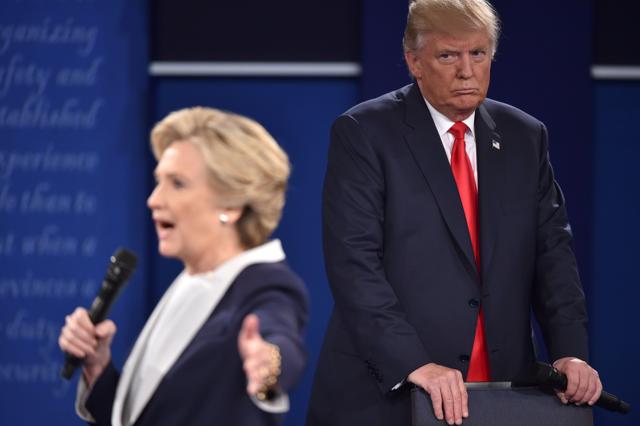 Donald Trump listens to Democratic presidential candidate Hillary Clinton during the second presidential debate at Washington University in St. Louis, Missouri. (AFP File Photo) Donald Trump listens to Democratic presidential candidate Hillary Clinton during the second presidential debate at Washington University in St. Louis, Missouri. (AFP File Photo)