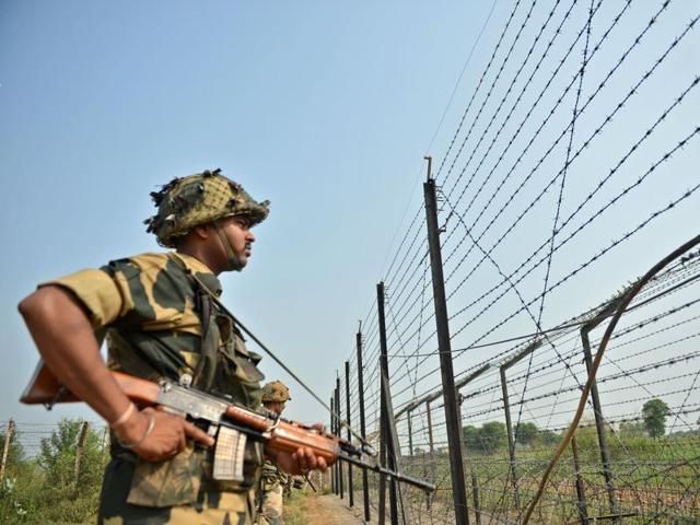 A Border Security Force (BSF) soldier takes up position at an outpost along a fence at the India-Pakistan border in RS Pora, southwest of Jammu. (AFP File Photo) A Border Security Force (BSF) soldier takes up position at an outpost along a fence at the India-Pakistan border in RS Pora, southwest of Jammu. (AFP File Photo)