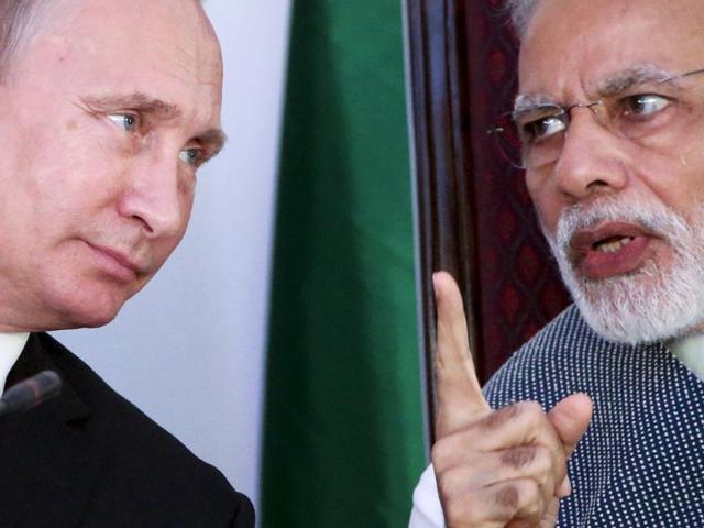 India's Prime Minister Narendra Modi (R) speaks with Russian President Vladimir Putin during an exchange of agreements event after the India-Russia Annual Summit in Benaulim, in the western state of Goa, India, October 15, 2016. REUTERS/Danish Siddiqui(REUTERS)