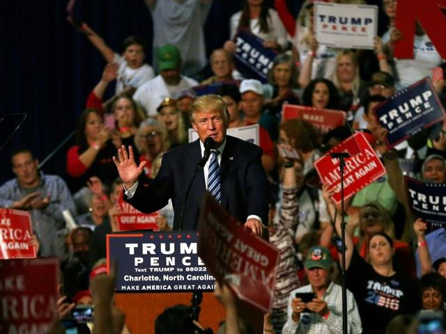 Republican presidential nominee Donald Trump addresses the crowd at his rally at the Convention Center in Charlotte, North Carolina on October 14, 2016. (AFP) Republican presidential nominee Donald Trump addresses the crowd at his rally at the Convention Center in Charlotte, North Carolina on October 14, 2016. (AFP)