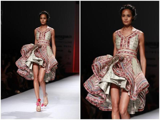 A model walking the ramp for Bhanuni Jyoti in a structured skirt.