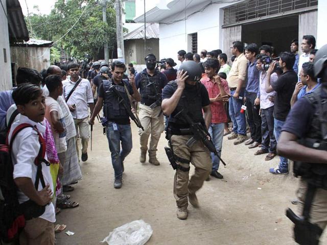 Bangladesh's Special Weapons and Tactics (SWAT) policemen return after a raid in Gazipur in Bangladesh on Oct. 8, 2016. (AP) Bangladesh's Special Weapons and Tactics (SWAT) policemen return after a raid in Gazipur in Bangladesh on Oct. 8, 2016. (AP)