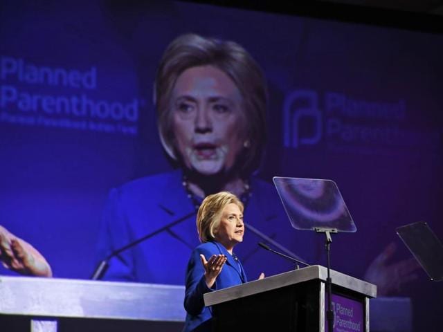 Democratic presidential nominee Hillary Clinton greets supporters as she leaves after speaking at a fundraiser at the Paramount Theater on October 14, 2016 in Seattle, Washington.(AFP File) Democratic presidential nominee Hillary Clinton greets supporters as she leaves after speaking at a fundraiser at the Paramount Theater on October 14, 2016 in Seattle, Washington.(AFP File)