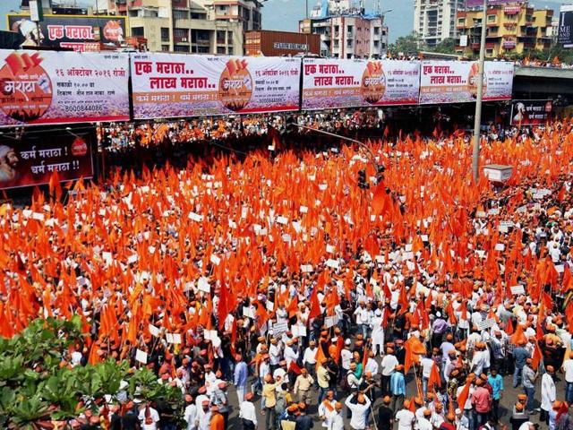 Maratha community people participate in a "Maratha Karnti Morcha" in Thane on Sunday.(PTI)