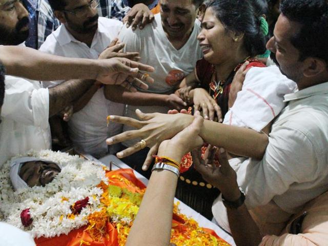 Recurring political violence between the RSS and the CPI(Mhave ) claimed more than 200 lives in north Kerala's Kannur district. Narayani during her son Remith’s funeral. (HT Photo) Recurring political violence between the RSS and the CPI(Mhave ) claimed more than 200 lives in north Kerala's Kannur district. Narayani during her son Remith’s funeral. (HT Photo)