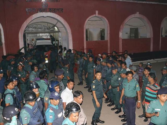 Bangladeshi prison security personnel stand guard in front of Khulna jail on Sunday. (AFP) Bangladeshi prison security personnel stand guard in front of Khulna jail on Sunday. (AFP)