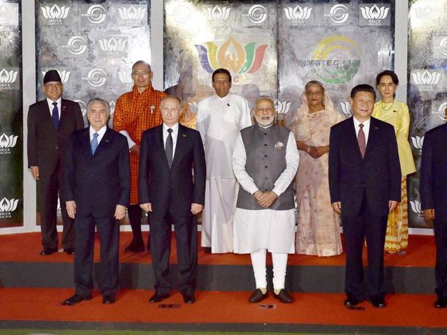 Prime Minister Narendra Modi along with BRICS and BIMSTEC leaders during a group photo in Mobor, Goa.(PTI Photo)