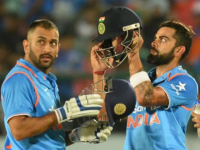 A mix-up with Virat Kohli led to Dhoni being run out for 21. (AP) A mix-up with Virat Kohli led to Dhoni being run out for 21. (AP)