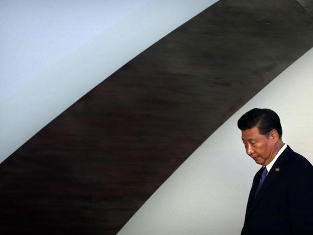 Chinese President Xi Jinping leaves at the end of the BRICS summit in Goa, India, Sunday. (AP) Chinese President Xi Jinping leaves at the end of the BRICS summit in Goa, India, Sunday. (AP)