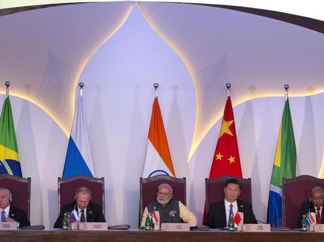 Leaders of BRICS nations, from left, Brazilian President Michel Temer, Russian President Vladimir Putin, Indian Prime Minister Narendra Modi, Chinese President Xi Jinping and South African President Jacob Zuma listen to the BRICS Business Council report during the summit in Goa.(AP) Leaders of BRICS nations, from left, Brazilian President Michel Temer, Russian President Vladimir Putin, Indian Prime Minister Narendra Modi, Chinese President Xi Jinping and South African President Jacob Zuma listen to the BRICS Business Council report during the summit in Goa.(AP)