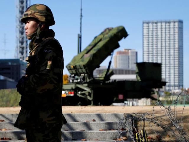 A Japan self-defense forces soldier guards near a unit of Patriot Advanced Capability-3 (PAC-3) missiles at the Defense Ministry in Tokyo. (Reuters File Photo) A Japan self-defense forces soldier guards near a unit of Patriot Advanced Capability-3 (PAC-3) missiles at the Defense Ministry in Tokyo. (Reuters File Photo)