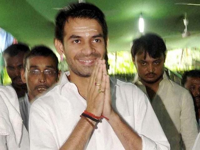 Bihar health minister Tej Pratap accepted a bouquet from accused Mohammad Kaif when he attended a lunch hosted by the civil surgeon on way to Siwan on February 13. (PTI file photo) Bihar health minister Tej Pratap accepted a bouquet from accused Mohammad Kaif when he attended a lunch hosted by the civil surgeon on way to Siwan on February 13. (PTI file photo)