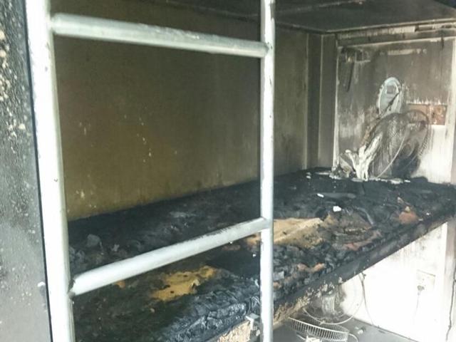 Charred remains in one of the flats which were engulfed in the fire. Charred remains in one of the flats which were engulfed in the fire.