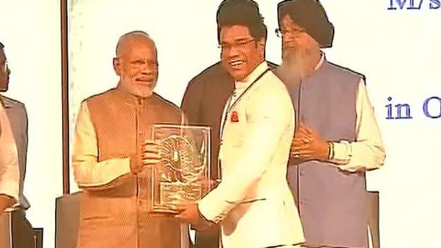 Narendra Modi honouring the MSME industrialists in Ludhiana. (Photo: ANI) Narendra Modi honouring the MSME industrialists in Ludhiana. (Photo: ANI)