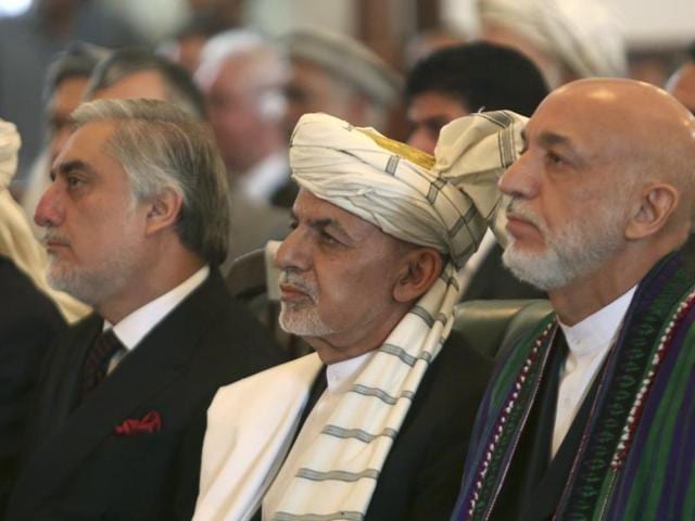 File photo of Afghan President Ashraf Ghani and former President Hamid Karzai.(AP Photo)