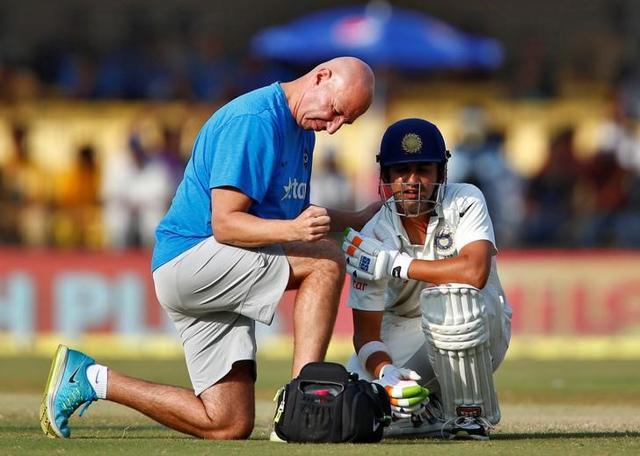 India's Gautam Gambhir (R) is attended by the team physio. (REUTERS) India's Gautam Gambhir (R) is attended by the team physio. (REUTERS)