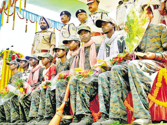 Nine PLFI members at the police headquarters in Ranchi after their surrender on Monday.(Parwaz Khan/HT Photo)