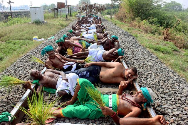 Farmers and opposition parties members stage a rail roko agitation at Trichy on Monday over the Cauvery water issue. (PTI) Farmers and opposition parties members stage a rail roko agitation at Trichy on Monday over the Cauvery water issue. (PTI)