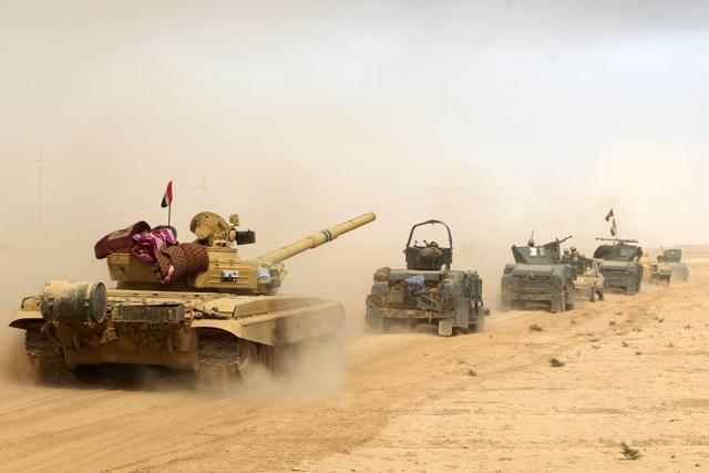 Iraqi forces advance towards Mosul. Some 30,000 federal forces are leading the offensive, backed by air and ground support from a 60-nation US-led coalition, in what is expected to be a long and difficult assault on IS's last major Iraqi stronghold. (AFP) Iraqi forces advance towards Mosul. Some 30,000 federal forces are leading the offensive, backed by air and ground support from a 60-nation US-led coalition, in what is expected to be a long and difficult assault on IS's last major Iraqi stronghold. (AFP)