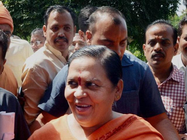 Union minister Uma Bharti outside the court in Bhopal in on Monday. (Mujeeb Faruqui/HT photo) Union minister Uma Bharti outside the court in Bhopal in on Monday. (Mujeeb Faruqui/HT photo)