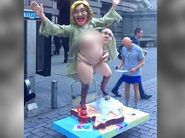 A statue of a topless, hoofed Hillary Clinton appeared outside a subway station in New York City. (Twitter) A statue of a topless, hoofed Hillary Clinton appeared outside a subway station in New York City. (Twitter)
