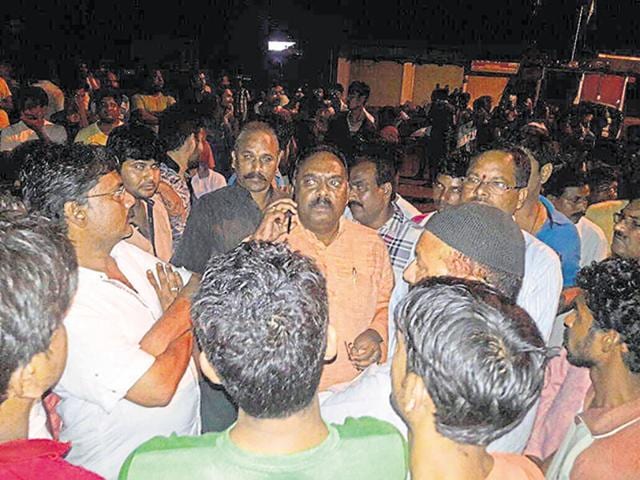 Former BJP MLA Bhagat Netam (talking over phone) outside the Baihar police station in Balaghat district on September 25. (HT file) Former BJP MLA Bhagat Netam (talking over phone) outside the Baihar police station in Balaghat district on September 25. (HT file)