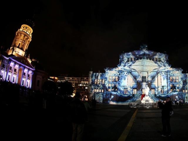 The Berlin Concert Hall (C), German and French Cathedrals are illuminated during the Festival of Lights show in Berlin, Germany October 7, 2016. REUTERS/Fabrizio Bensch (REUTERS)