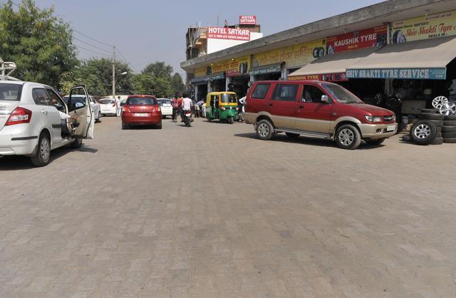 In Burail village, tiles have been laid in select market areas. (Keshav Singh/HT Photo)