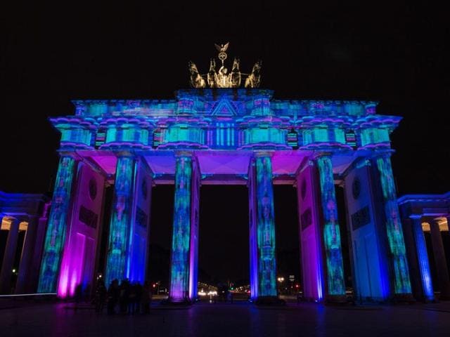 Colourful designs are projected on the facade of the Brandenburg Gate as part of the yearly “Festival of Lights” in Berlin. (AFP Photo)