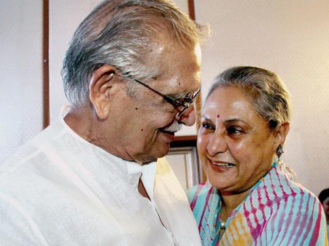 Jaya Bachchan and Gulzar share a light moment during the launch of the album Gulzar in conversation with Tagore. (PTI Photo)
