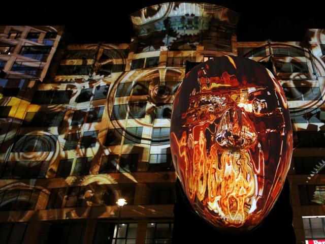 A building near Potsdamer Platz square is illuminated during the Festival of Lights show in Berlin, Germany. (REUTERS)