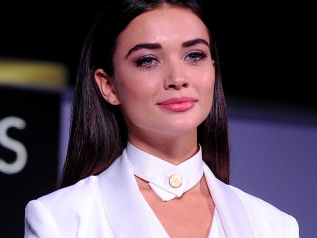 Amy Jackson poses for a photograph during a promotional event in Mumbai. (AFP Photo)