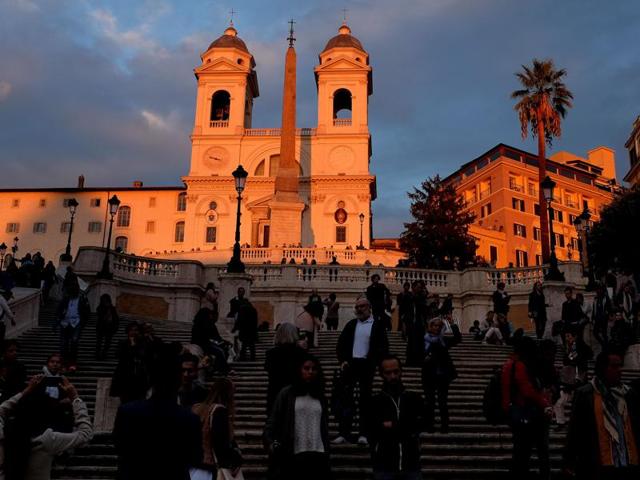People walk the Spanish Steps, with the Trinita dei Monti church in background, on October 18, 2016 in Rome during the Rome Film Festival. (AFP) People walk the Spanish Steps, with the Trinita dei Monti church in background, on October 18, 2016 in Rome during the Rome Film Festival. (AFP)