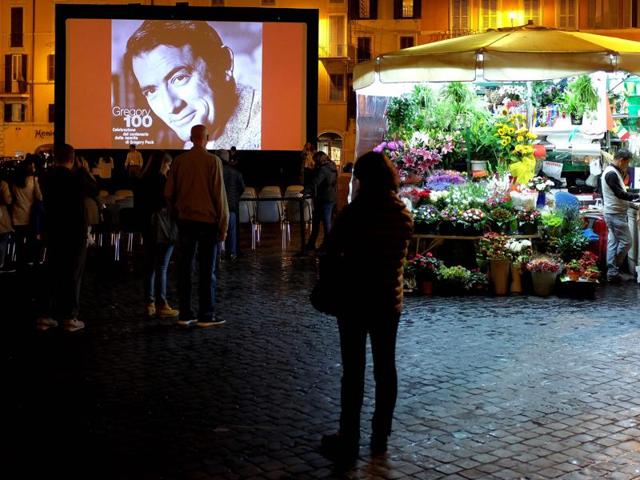 Actor Gregory Peck is seen during the outdoors screening of Roman Holiday on October 18, 2016 in Rome's Spanish Square as part of the 11th Rome Film Festival. (AFP) Actor Gregory Peck is seen during the outdoors screening of Roman Holiday on October 18, 2016 in Rome's Spanish Square as part of the 11th Rome Film Festival. (AFP)