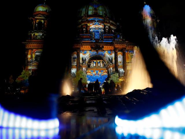 The Berlin Cathedral is illuminated during the Festival of Lights show in Berlin, Germany. (REUTERS)
