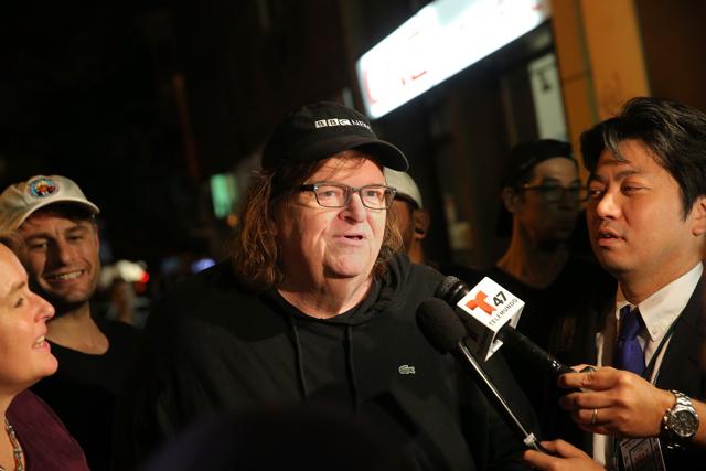 Director Michael Moore speaks to the media at the premiere of his documentary Michael Moore In TrumpLand at the IFC Center on October 18, 2016 in New York City. (AFP)