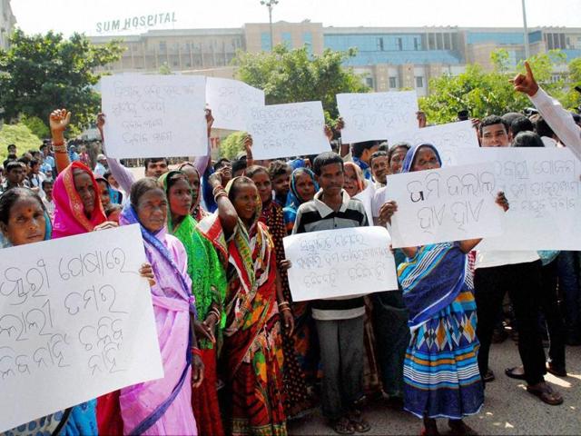 A group of protesters shouting slogans during a demonstration in front of SUM Hospital to demand arrest of head of the group of institutions, in Bhubaneswar on Wednesday. (PTI) A group of protesters shouting slogans during a demonstration in front of SUM Hospital to demand arrest of head of the group of institutions, in Bhubaneswar on Wednesday. (PTI)