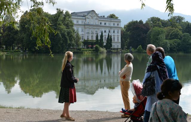 8. Tourists stand in front of the Leopoldskron Palace where part of the film Sound of Music was shot, in Salzburg, Austria, on August 1, 2014. Every year nearly 300,000 people visit the Trapp Family homes and film locations. The 1965 film about the moving life of the novice, Maria von Trapp and her singing family became an international success. (AFP) 8. Tourists stand in front of the Leopoldskron Palace where part of the film Sound of Music was shot, in Salzburg, Austria, on August 1, 2014. Every year nearly 300,000 people visit the Trapp Family homes and film locations. The 1965 film about the moving life of the novice, Maria von Trapp and her singing family became an international success. (AFP)