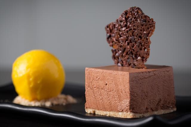 The dark chocolate mousse with mandarin sorbet at Hakkasan is made using agar agar instead of eggs (Photo: Hakkasan)