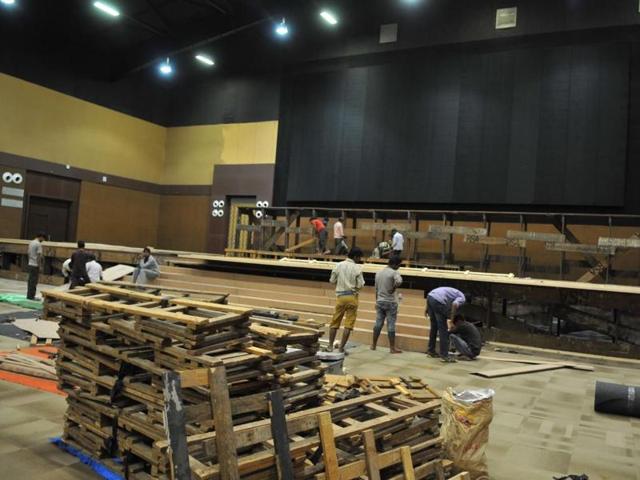 The main hall where global investors summit will be held being decked up at Brilliant Convention Centre in Indore.(Shankar Mourya/ HT Photo)