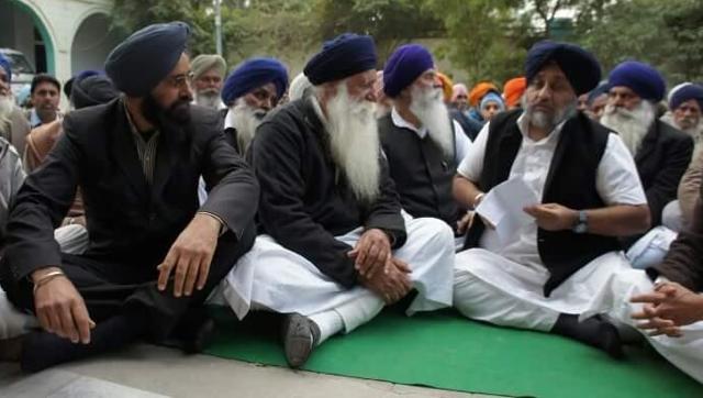 Fom left: Kalyan Singh, his father and SGPC member Sukhchain Singh Dharampura, and deputy CM and SAD president Sukhbir Singh Badal. (Photo: Facebook, as uploaded by Kalyan earlier this month ) Fom left: Kalyan Singh, his father and SGPC member Sukhchain Singh Dharampura, and deputy CM and SAD president Sukhbir Singh Badal. (Photo: Facebook, as uploaded by Kalyan earlier this month )