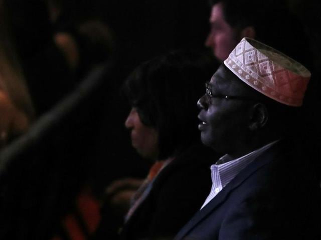 Malik Obama, President Barack Obama's Kenyan-born half-brother, listens to the candidates speak during the third US presidential debate. (AFP Photo) Malik Obama, President Barack Obama's Kenyan-born half-brother, listens to the candidates speak during the third US presidential debate. (AFP Photo)