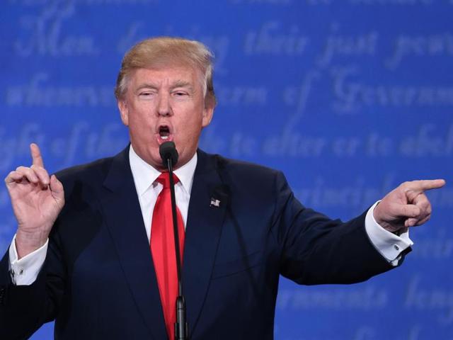 TOPSHOT - US Republican presidential candidate Donald Trump speaks during the final presidential debate at the Thomas & Mack Center on the campus of the University of Las Vegas in Las Vegas, Nevada on October 19, 2016. / AFP PHOTO / SAUL LOEB (AFP) TOPSHOT - US Republican presidential candidate Donald Trump speaks during the final presidential debate at the Thomas & Mack Center on the campus of the University of Las Vegas in Las Vegas, Nevada on October 19, 2016. / AFP PHOTO / SAUL LOEB (AFP)