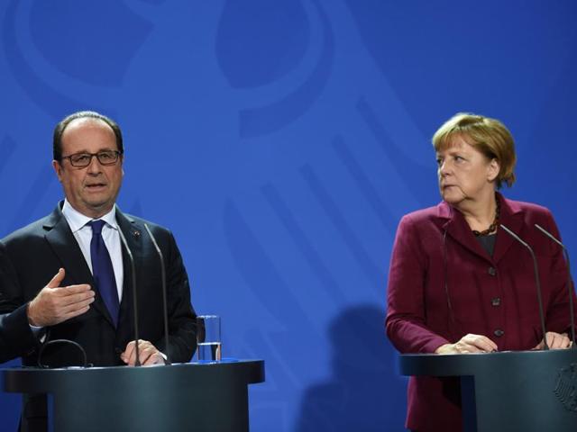 French President Francois Hollande speaks during a press conference with German Chancellor Angela Merkel (right) after a meeting of the leaders of Russia, Ukraine, France and Germany on a new push for peace in eastern Ukraine at the chancellery in Berlin. (AFP Photo) French President Francois Hollande speaks during a press conference with German Chancellor Angela Merkel (right) after a meeting of the leaders of Russia, Ukraine, France and Germany on a new push for peace in eastern Ukraine at the chancellery in Berlin. (AFP Photo)