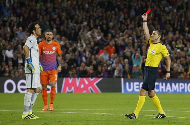 Bravo is given the marching orders by the referee. (REUTERS) Bravo is given the marching orders by the referee. (REUTERS)