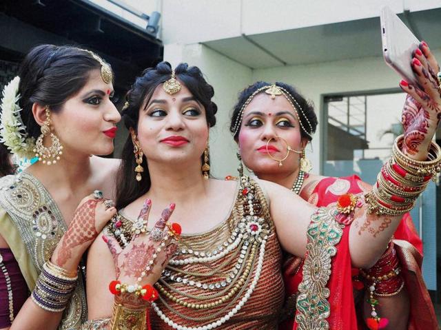 Or pose for selfies like these married women from Jalandhar in Punjab. Married women decorate their hands with henna on Karva Chauth festival and observe a fast to pray for the longevity and well being of their husbands. A look at the festivities across India. (PTI) Or pose for selfies like these married women from Jalandhar in Punjab. Married women decorate their hands with henna on Karva Chauth festival and observe a fast to pray for the longevity and well being of their husbands. A look at the festivities across India. (PTI)