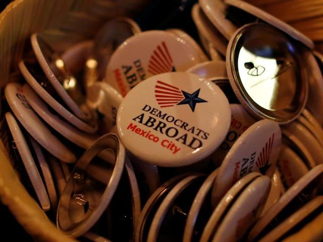 Pins are seen at a Democrats Abroad television broadcast of the third presidential debate. (Reuters Photo) Pins are seen at a Democrats Abroad television broadcast of the third presidential debate. (Reuters Photo)