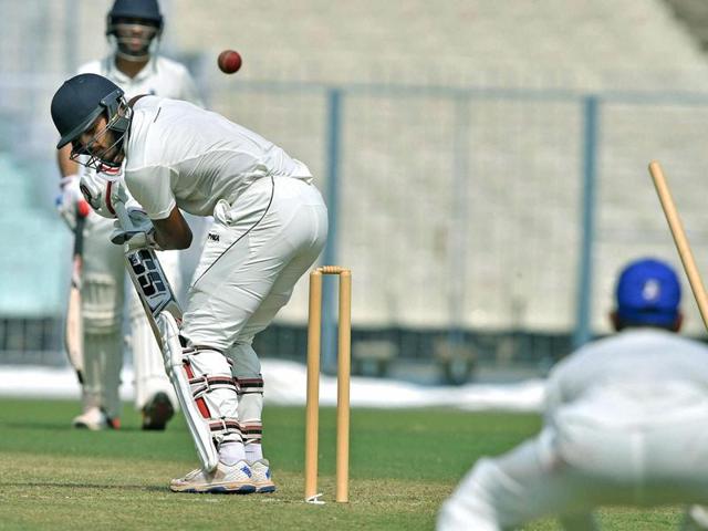 Delhi batsman N Rana is clean bowled by Karnataka bowler A.Mithun. (PTI Photo) Delhi batsman N Rana is clean bowled by Karnataka bowler A.Mithun. (PTI Photo)