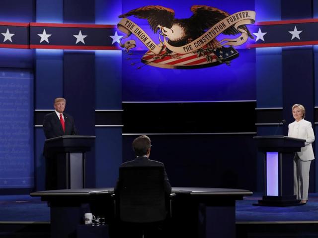 Republican US presidential nominee Donald Trump and Democratic nominee Hillary Clinton begin their third and final 2016 presidential campaign debate at UNLV in Las Vegas, Nevada, US. (REUTERS) Republican US presidential nominee Donald Trump and Democratic nominee Hillary Clinton begin their third and final 2016 presidential campaign debate at UNLV in Las Vegas, Nevada, US. (REUTERS)